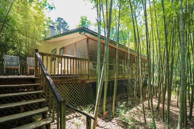 407 Lakeshore Dr, Bainbridge, GA 39819 - exterior space featuring a sunroom and stairway