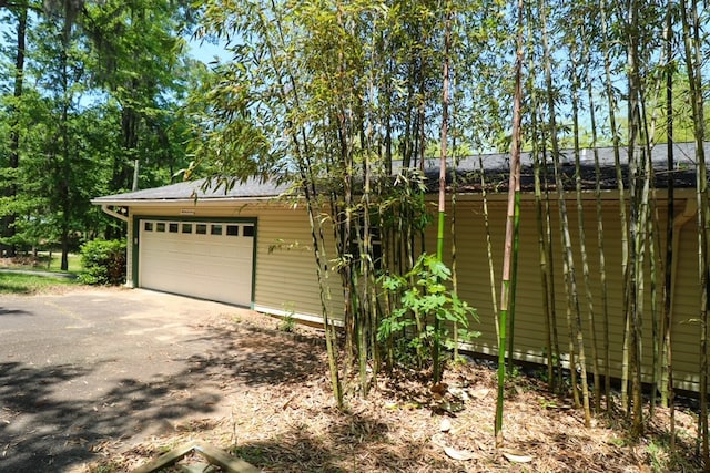 407 Lakeshore Dr, Bainbridge, GA 39819 - garage featuring aphalt driveway