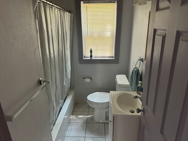 full bathroom featuring vanity, shower / bath combination with curtain, and toilet