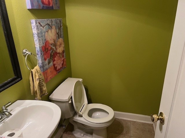 1002 Willis St, Bainbridge, GA 39819 - bathroom with toilet and tile patterned flooring