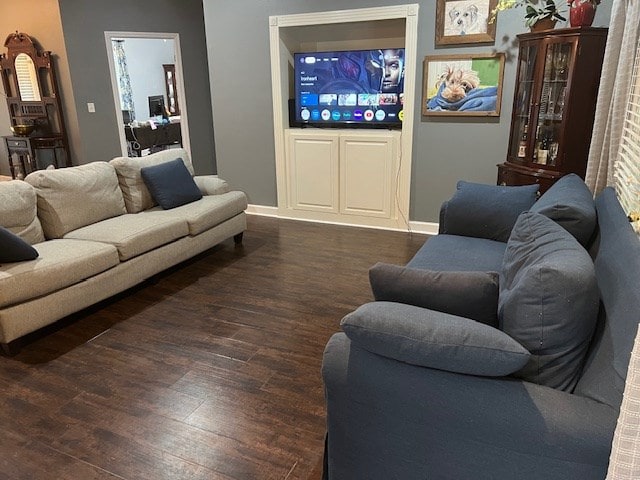 1002 Willis St, Bainbridge, GA 39819 - living room with wood finished floors and baseboards