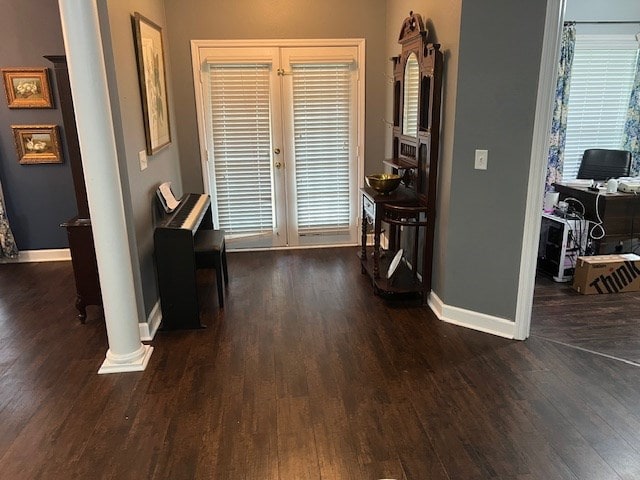 1002 Willis St, Bainbridge, GA 39819 - corridor with wood finished floors and decorative columns