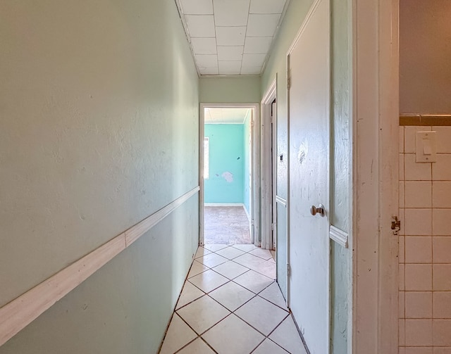 hallway with light tile patterned flooring