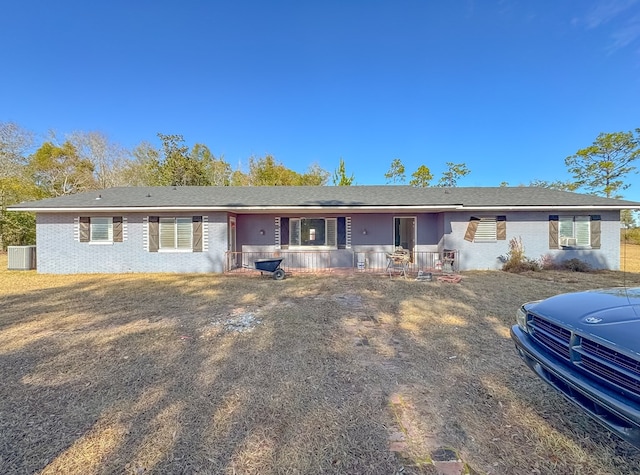 single story home featuring central air condition unit