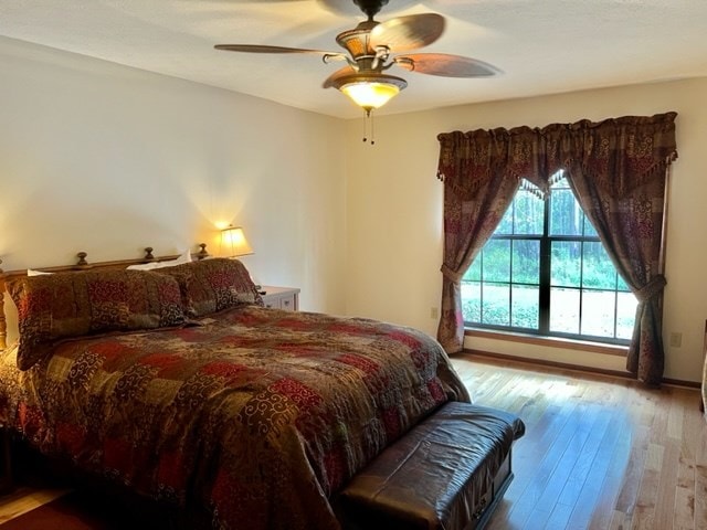 267 Providence Rd, Whigham, GA 39897 - bedroom featuring hardwood / wood-style floors and ceiling fan