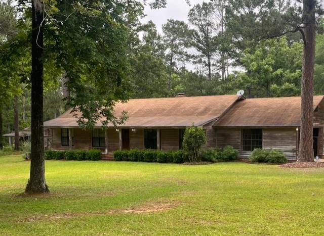 267 Providence Rd, Whigham, GA 39897 - ranch-style house featuring a front yard and covered porch