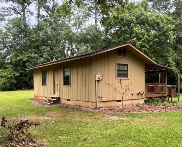 267 Providence Rd, Whigham, GA 39897 - view of property exterior with crawl space, a yard, entry steps, and view of scattered trees