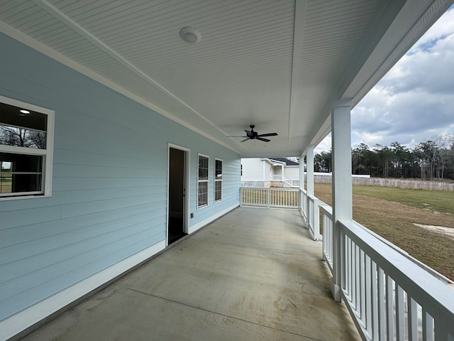 view of patio / terrace with a porch and a ceiling fan