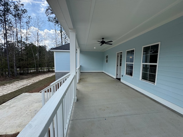 view of patio featuring a ceiling fan