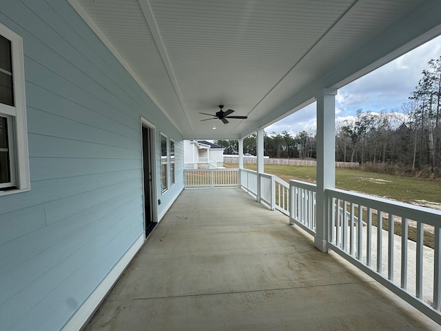 view of patio featuring covered porch and a ceiling fan