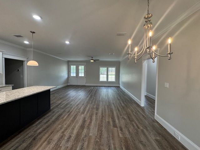 unfurnished living room featuring baseboards, ornamental molding, and dark wood-type flooring