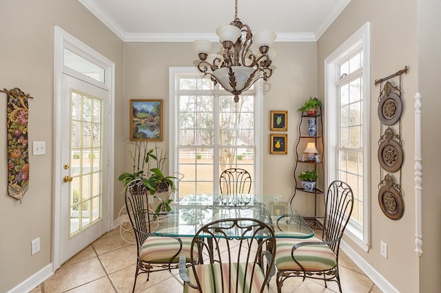 tiled dining area with crown molding and a chandelier