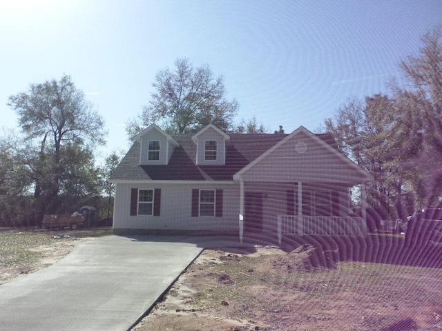 view of new england style home