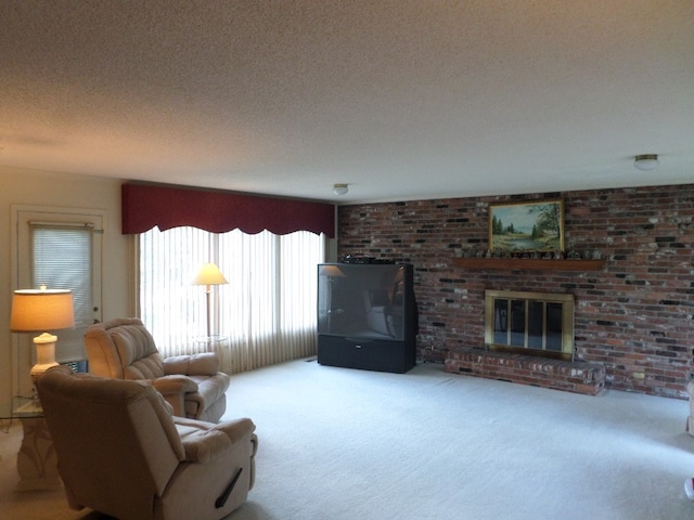 701 Collier St, Bainbridge, GA 39819 - living area featuring carpet floors, a fireplace, and a textured ceiling