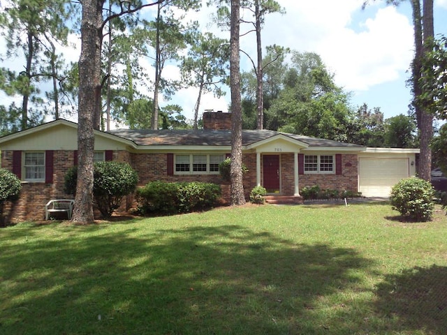 701 Collier St, Bainbridge, GA 39819 - ranch-style home with a garage, a chimney, brick siding, and a front yard