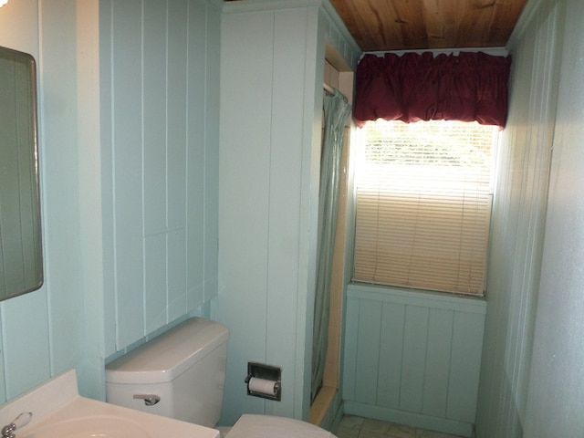 701 Collier St, Bainbridge, GA 39819 - full bathroom with curtained shower, vanity, and wooden ceiling