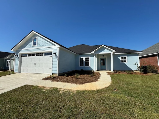 single story home with a garage and a front yard