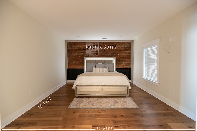 bedroom with dark wood-type flooring