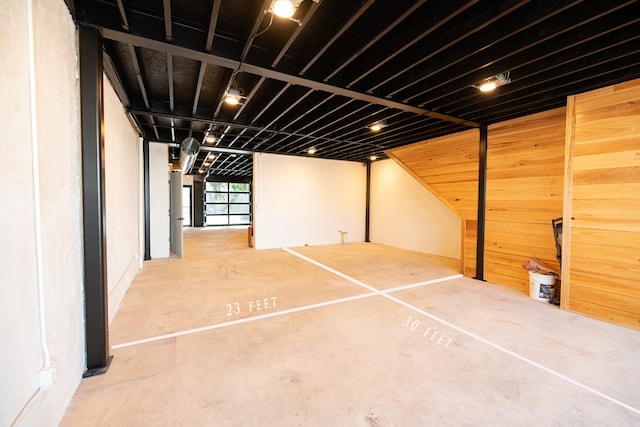 basement with wooden walls