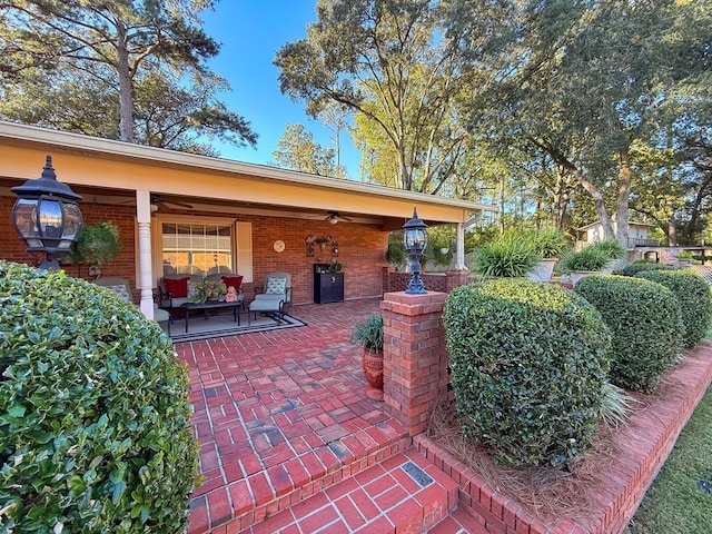 view of patio / terrace featuring a ceiling fan