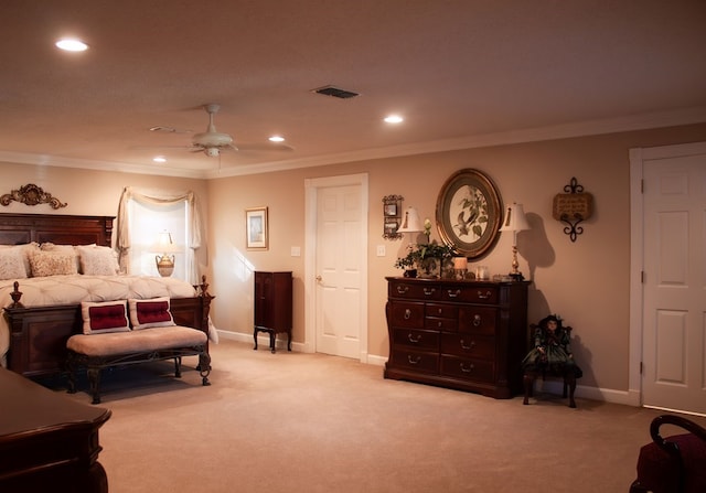 carpeted bedroom featuring visible vents, recessed lighting, crown molding, and baseboards