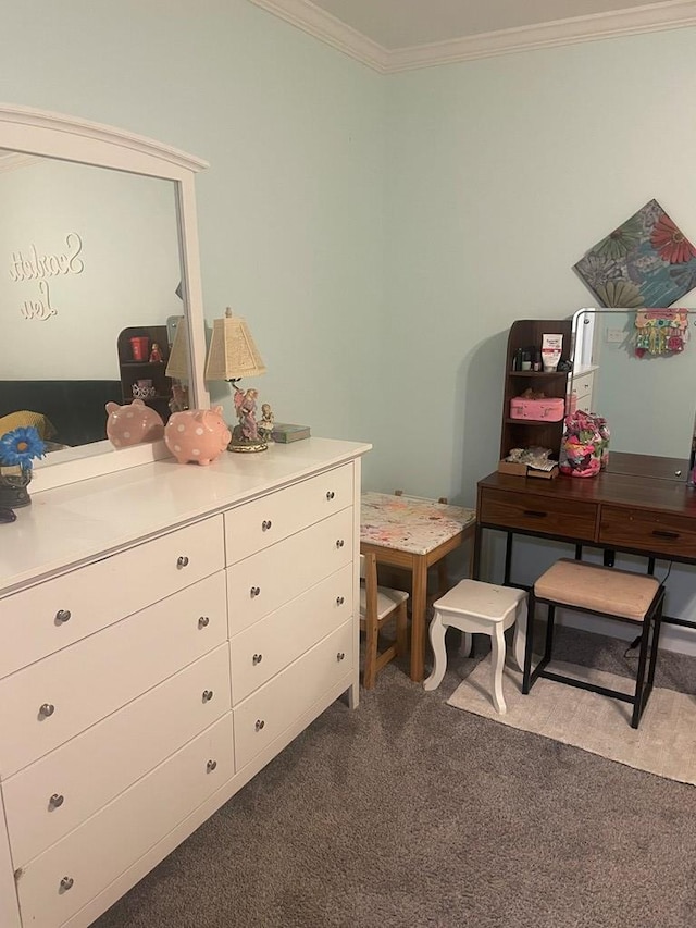 bedroom featuring ornamental molding and dark carpet