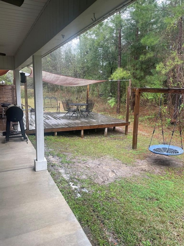 view of yard featuring a deck