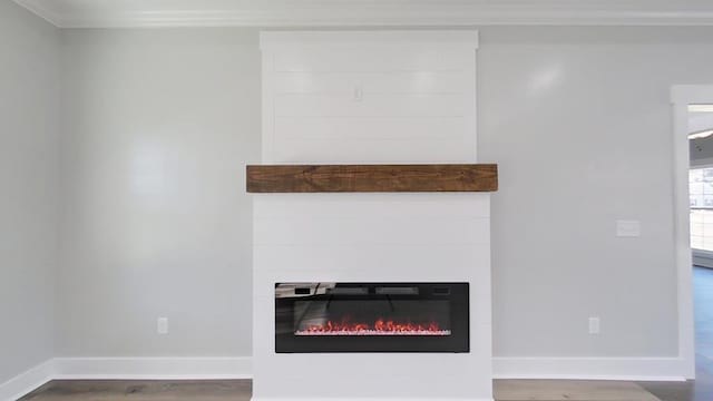 room details featuring crown molding and wood-type flooring