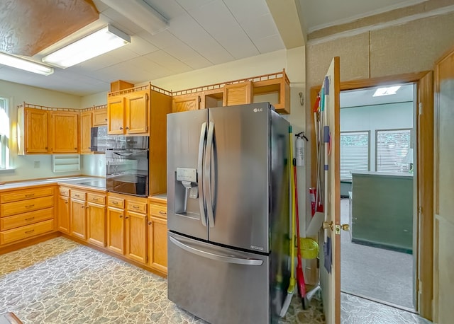 kitchen featuring backsplash and appliances with stainless steel finishes