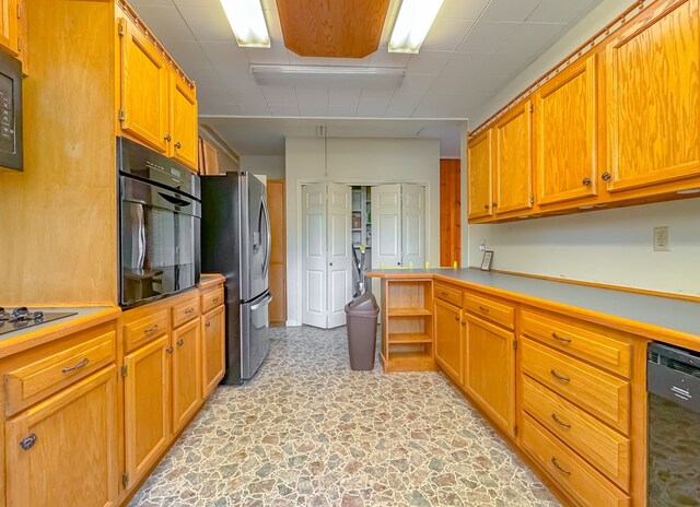 kitchen with black appliances