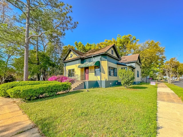 view of property exterior featuring a lawn