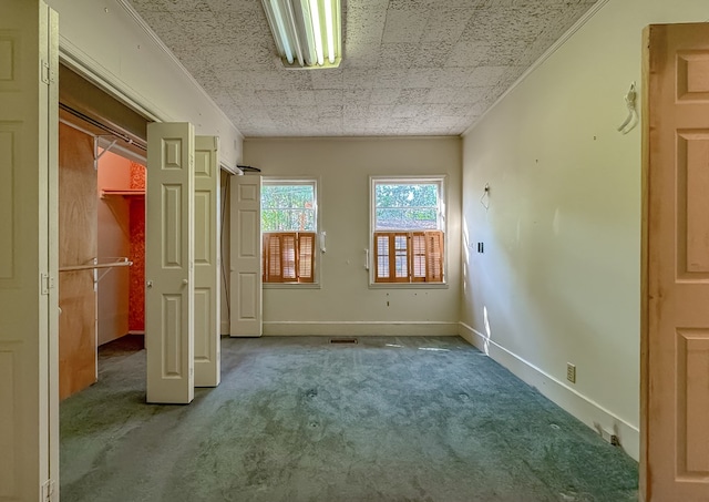 unfurnished bedroom with carpet flooring