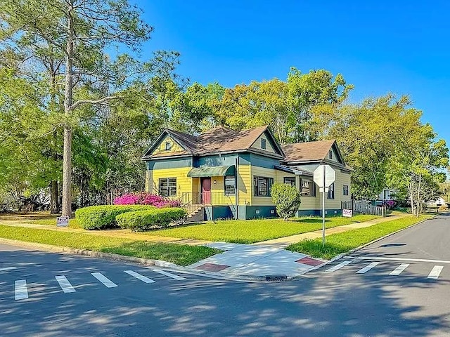 exterior space featuring a front yard