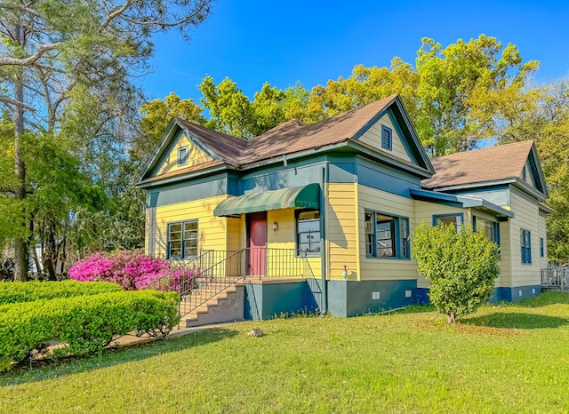 view of front of home with a front yard