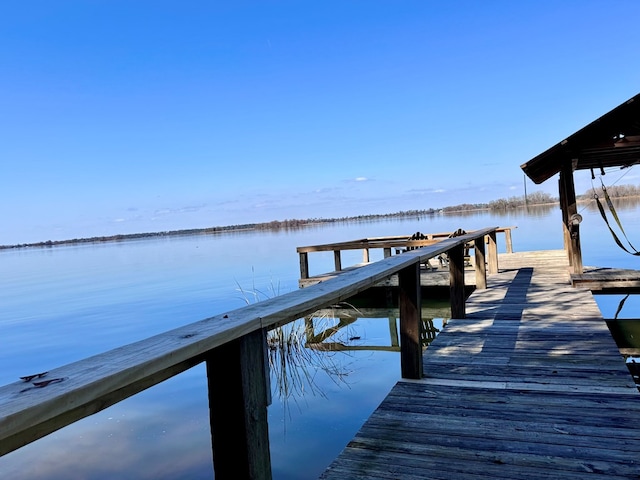 view of dock featuring a water view