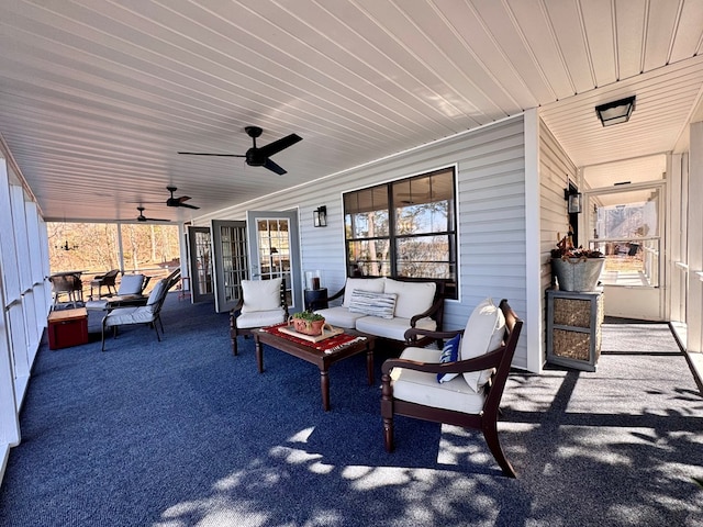 view of patio with ceiling fan and an outdoor hangout area