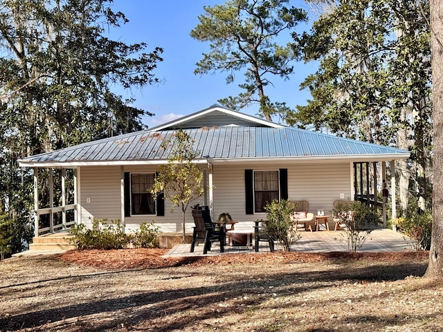 back of house featuring a patio