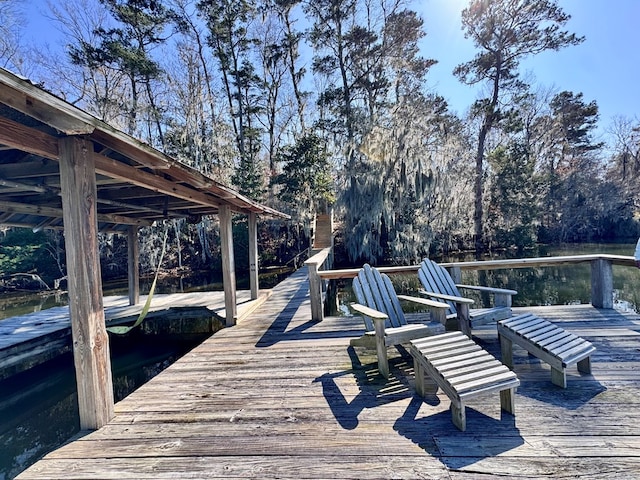 view of dock with a water view