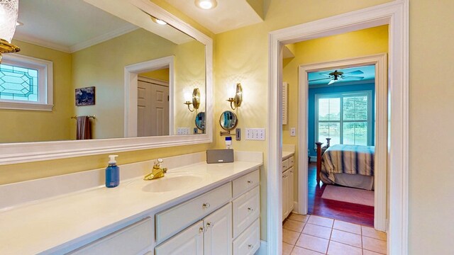 1389 Lake Front Dr, Cairo, GA 39828 - ensuite bathroom with vanity, tile patterned flooring, crown molding, and ceiling fan