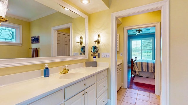 1389 Lake Front Dr, Cairo, GA 39828 - ensuite bathroom with vanity, tile patterned flooring, crown molding, and ceiling fan