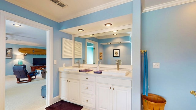 1389 Lake Front Dr, Cairo, GA 39828 - bathroom with ornamental molding, double vanity, and recessed lighting