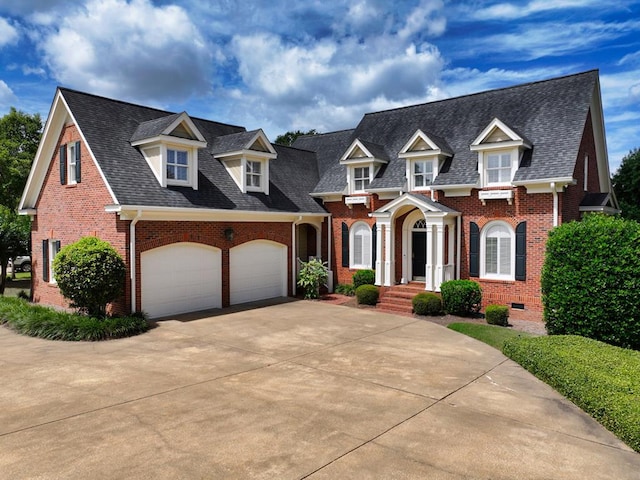 1389 Lake Front Dr, Cairo, GA 39828 - view of front facade featuring brick siding, concrete driveway, an attached garage, and a shingled roof
