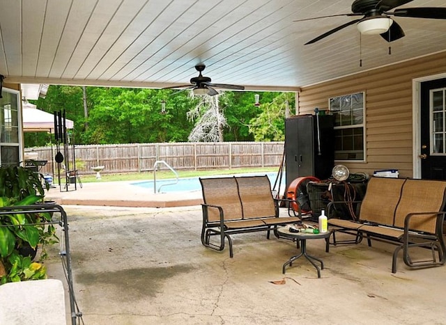 2497 Vada Rd, Bainbridge, GA 39817 - fenced backyard with ceiling fan and a patio