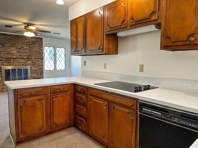 kitchen featuring kitchen peninsula, light colored carpet, ceiling fan, black appliances, and a fireplace