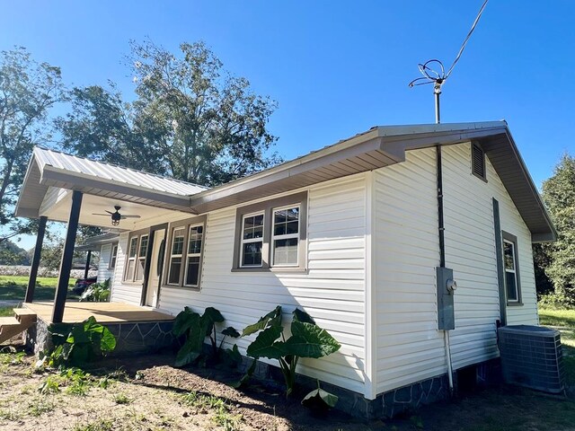 5233 Coffee Rd, Thomasville, GA 31792 - view of home's exterior with a ceiling fan and cooling unit