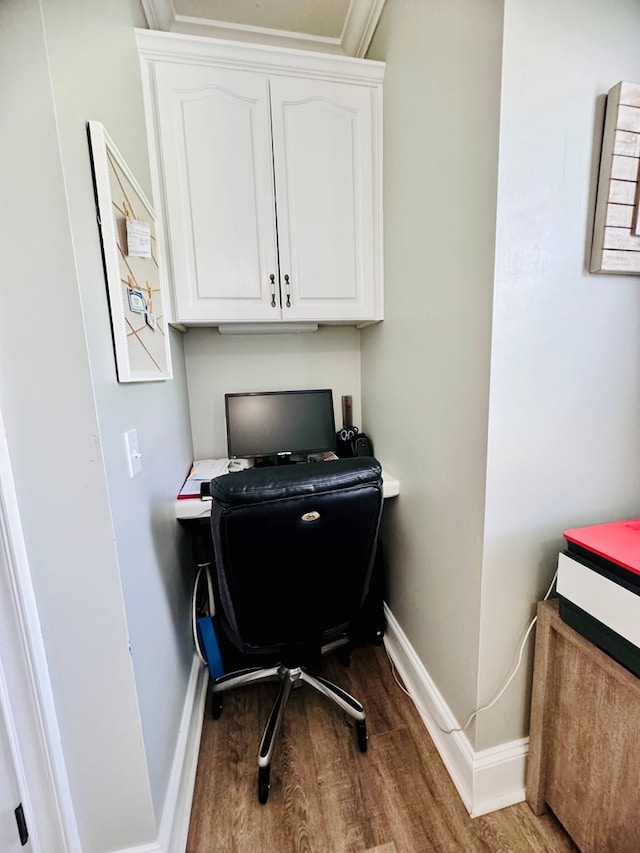 office space with hardwood / wood-style floors