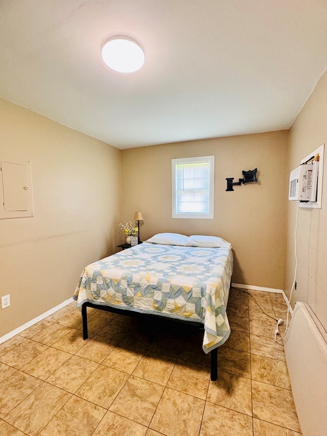 tiled bedroom featuring a wall unit AC