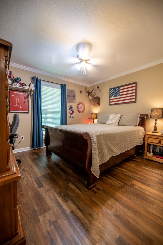 186 Turtle Pond Rd, Bainbridge, GA 39817 - bedroom featuring dark wood finished floors, crown molding, a ceiling fan, and a textured ceiling