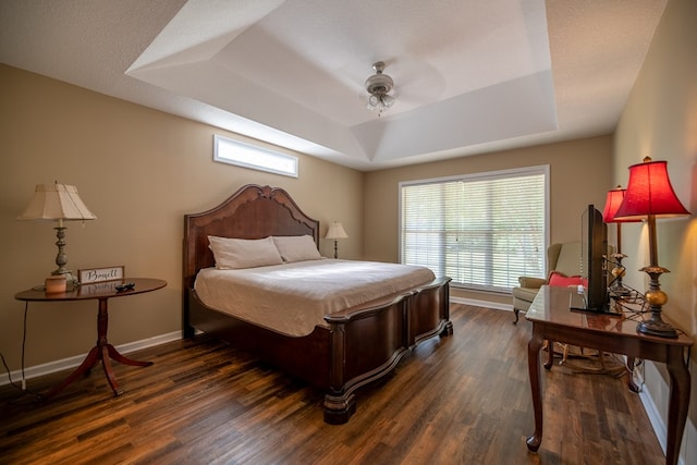 186 Turtle Pond Rd, Bainbridge, GA 39817 - bedroom with a raised ceiling, dark wood-style flooring, and ceiling fan