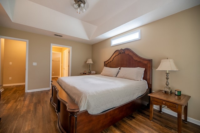 186 Turtle Pond Rd, Bainbridge, GA 39817 - bedroom featuring dark wood-type flooring and a raised ceiling